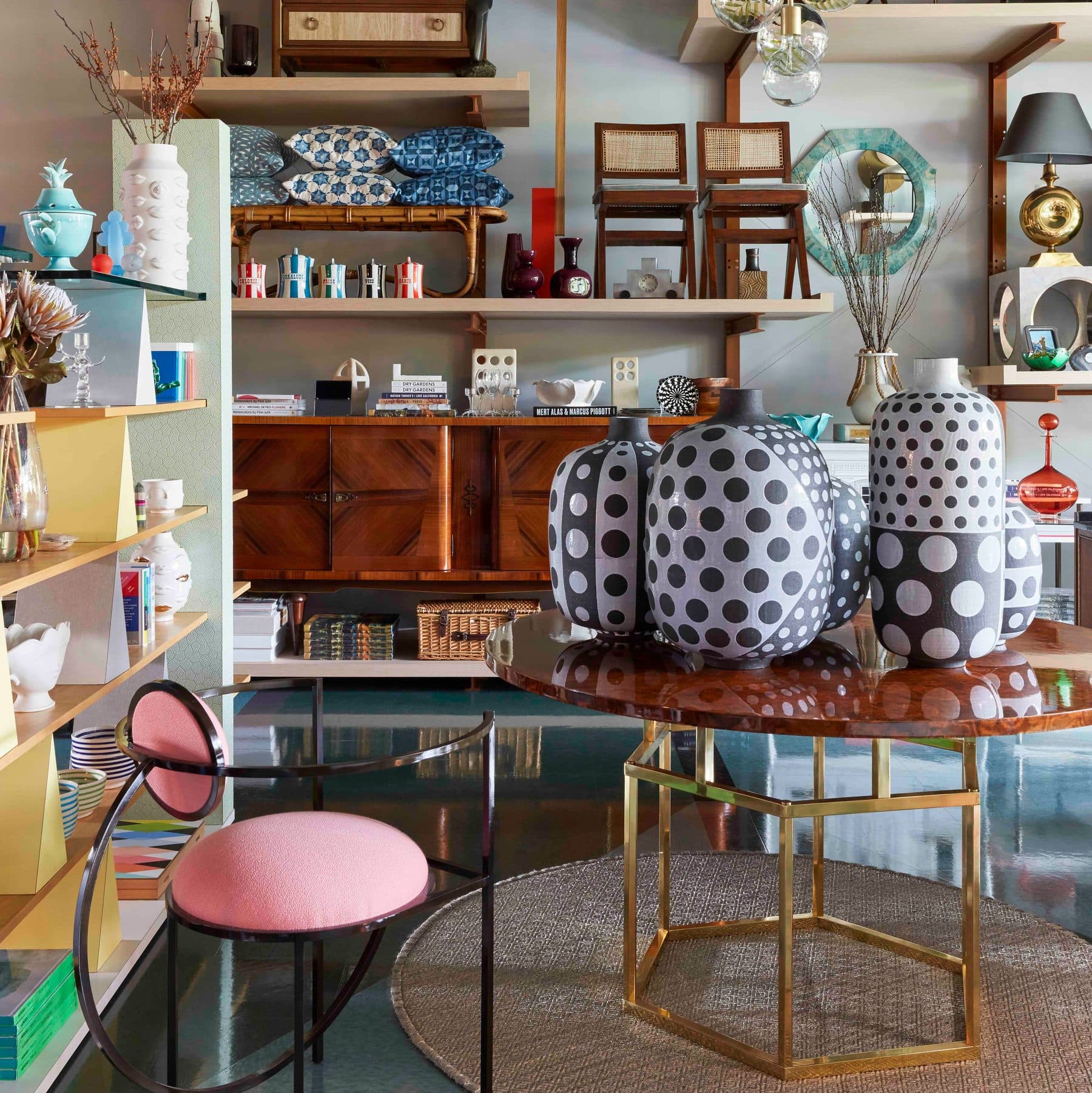 A colorful, eclectic showroom displaying decorative vases and objects